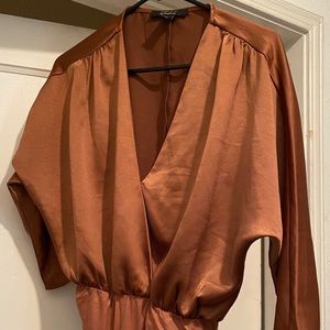 Beautiful copper wrap body suit.